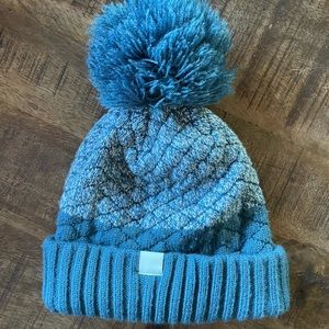 Women’s Under Amour beanie with poof on top